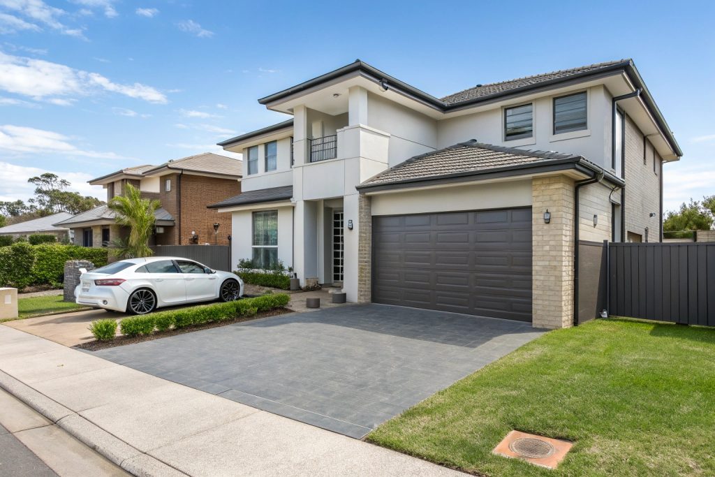 Modern Liverpool home with professionally installed garage door showcasing quality residential installation